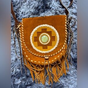 Handmade leather chakana crossbody bag from Peru